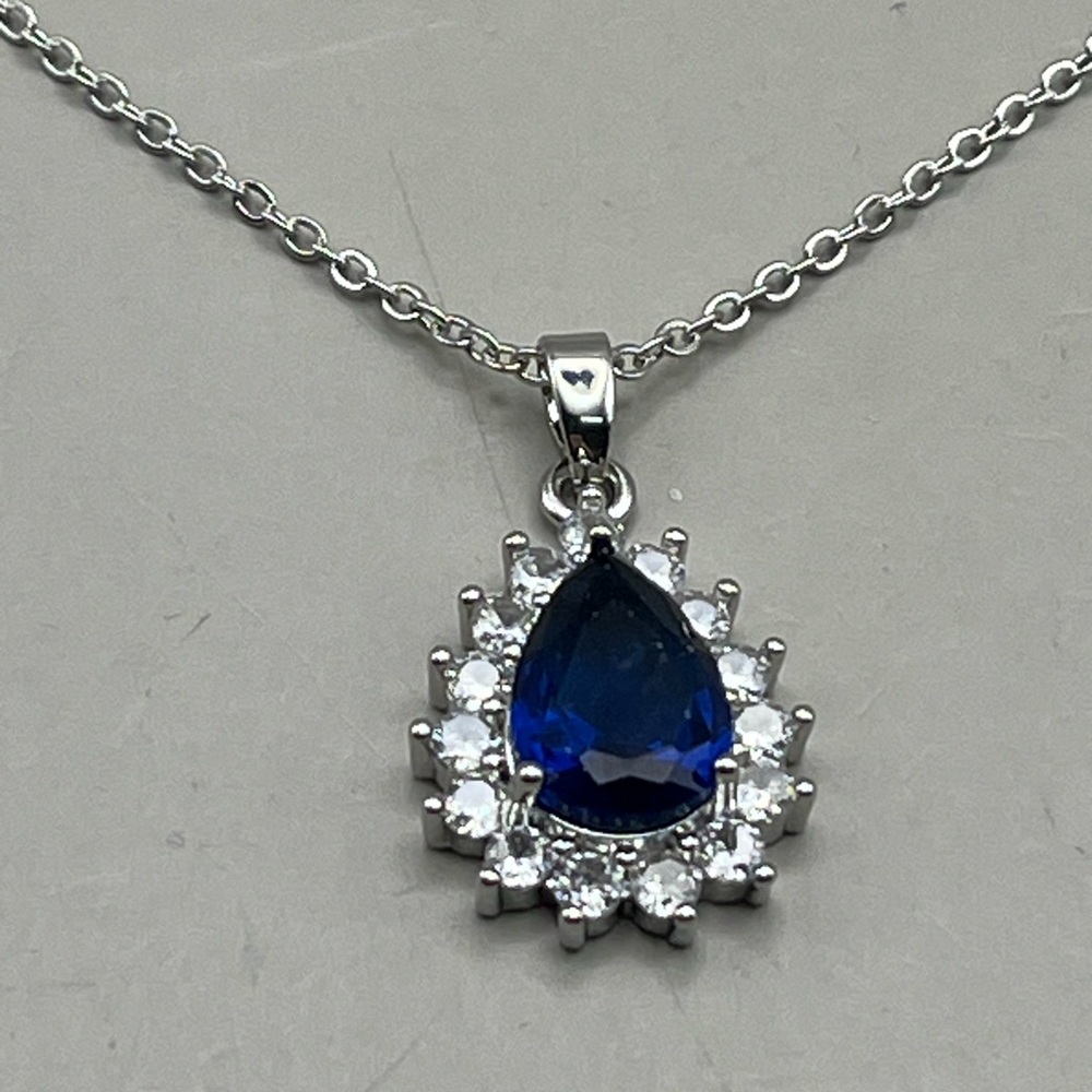 Elegant Silver and Blue Teardrop Pendant Necklace with CZ Halo